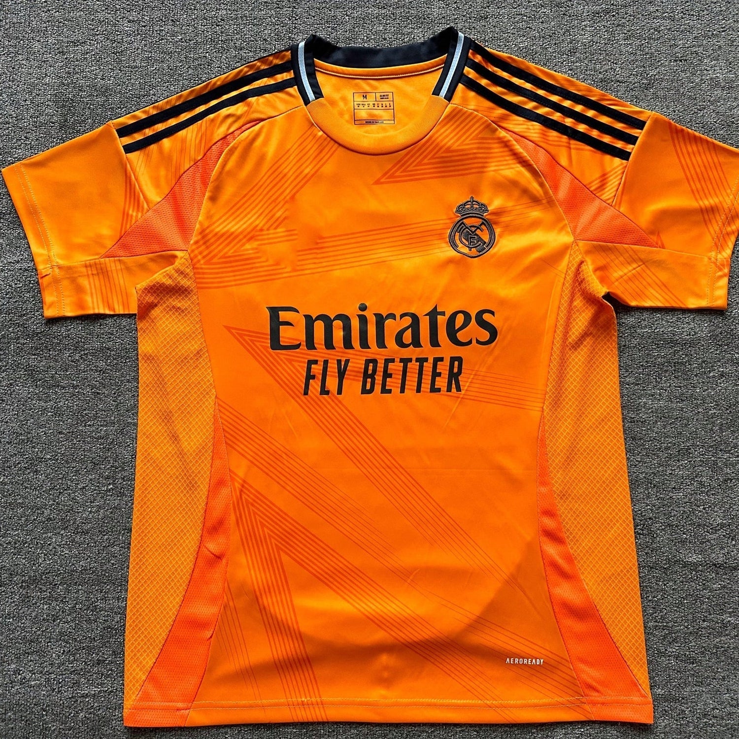 Maillot Real Madrid Orange et Noir 24/25